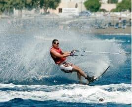 A person water skiing Description automatically generated with low confidence